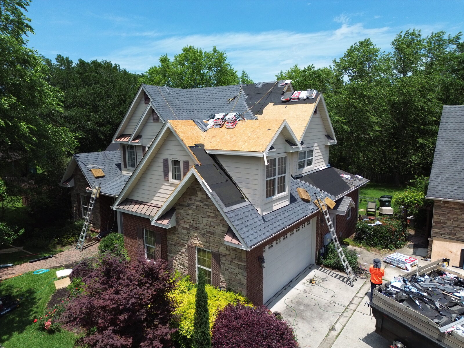 Residential roof replacement, aerial